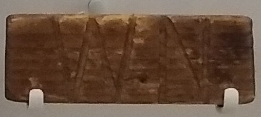 The Welsh Not artifact on display at St Fagans National Museum of History, dated 1852, formerly used at Pontgarreg School in Llangrannog