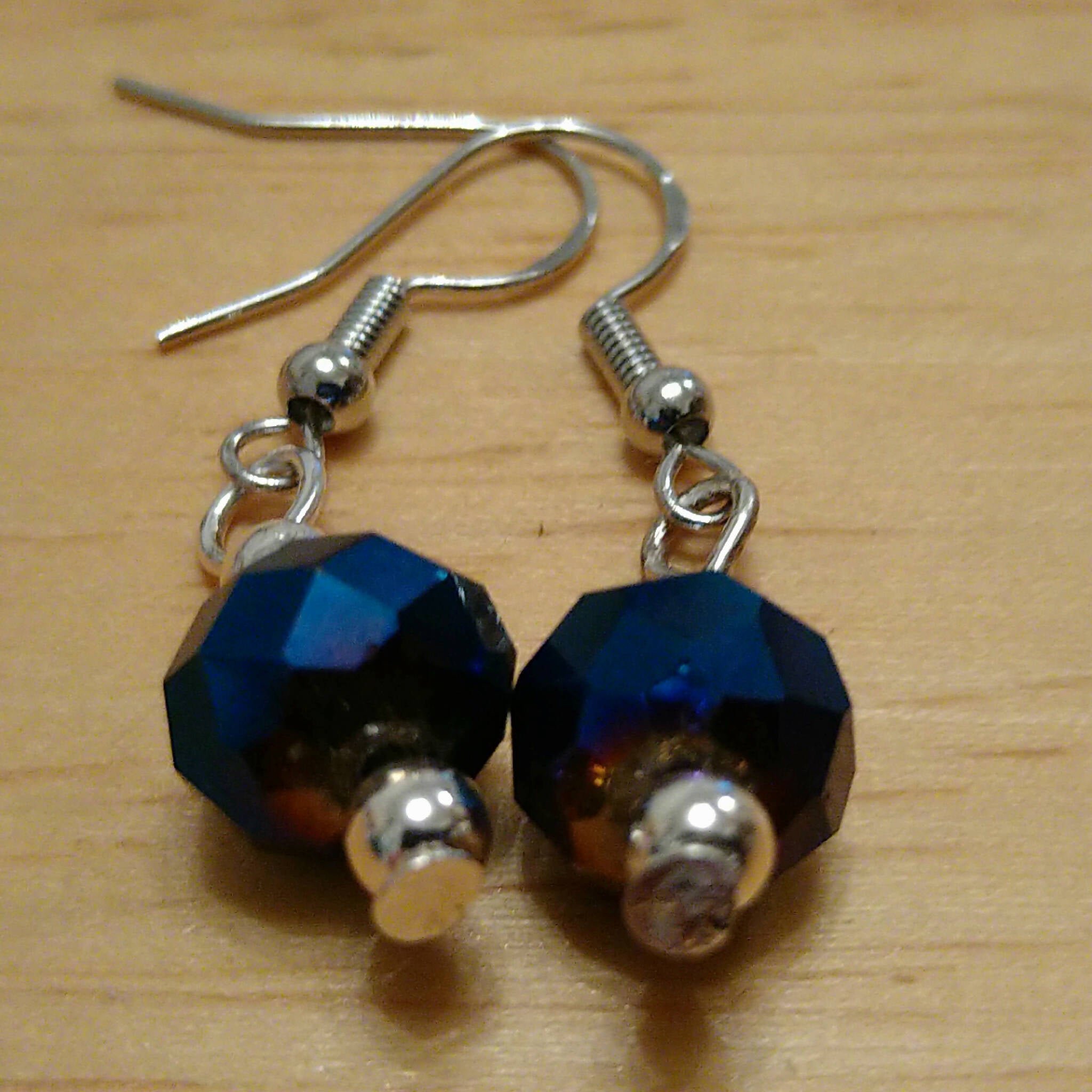 Handmade earrings with blue faceted AB bead