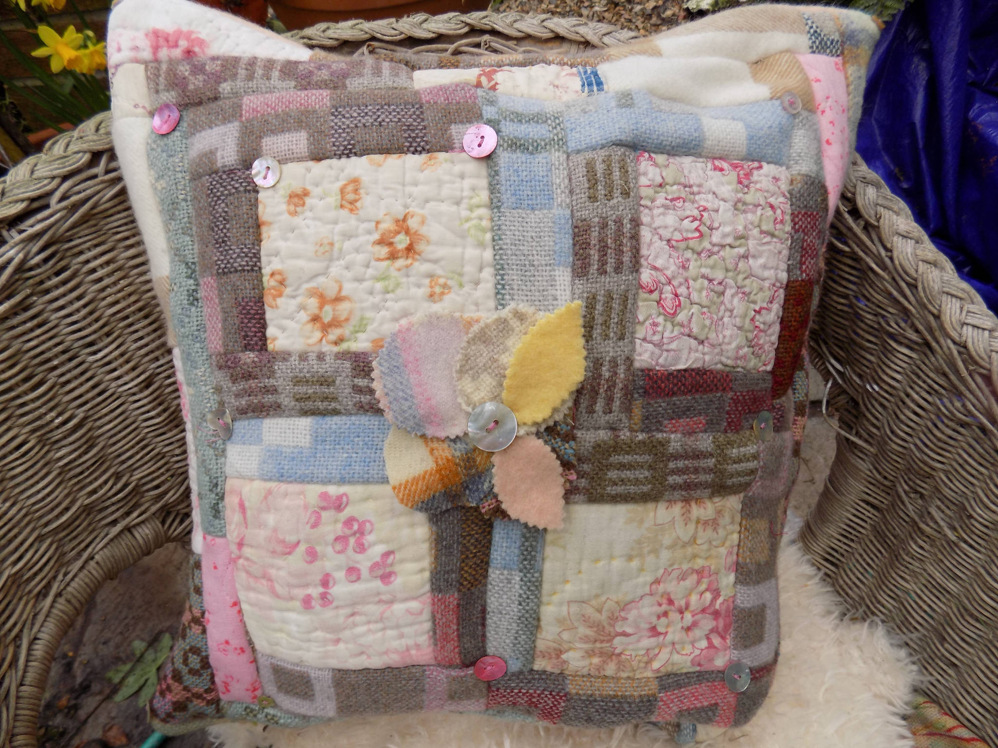 Wonky Welsh Cushions created from reclaimed Welsh wool fabrics and vintage Quilts.