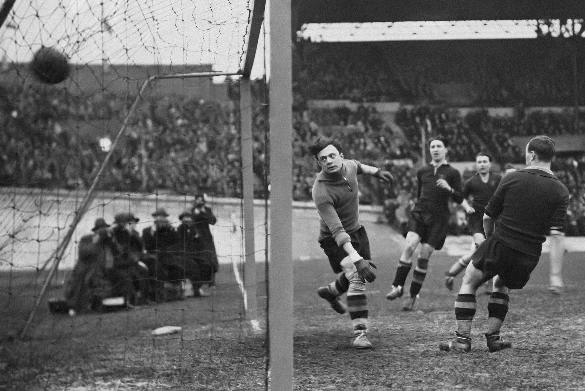 Vintage football match from the 1930s — evoking the era of Wales at the 1958 World Cup in Sweden
