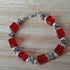 Red & Silver coloured bracelet, handmade using recycled beads.