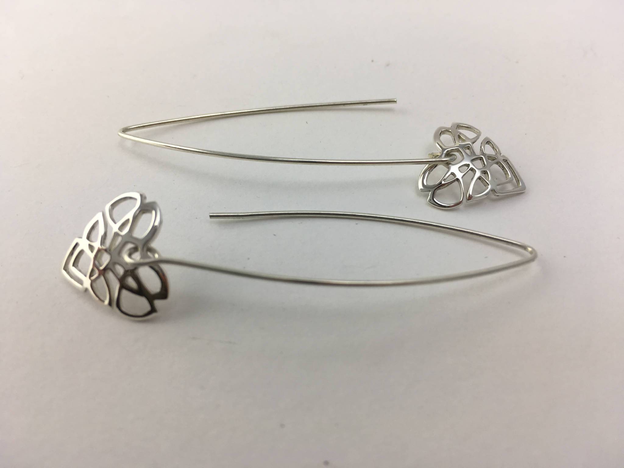 Full Celtic knot design heart shaped long drop earrings