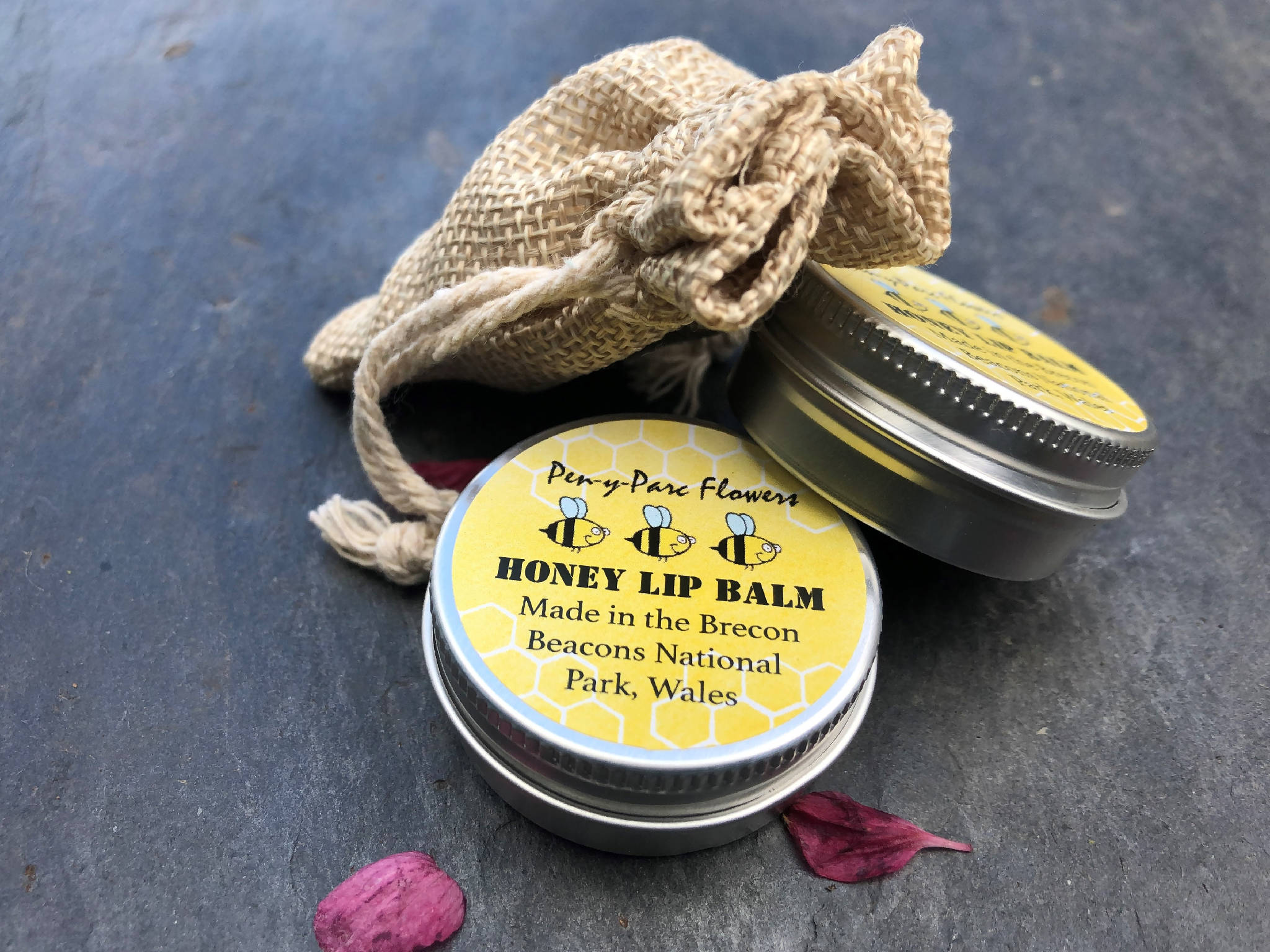 Handmade natural beeswax lip balm in jute gift bag