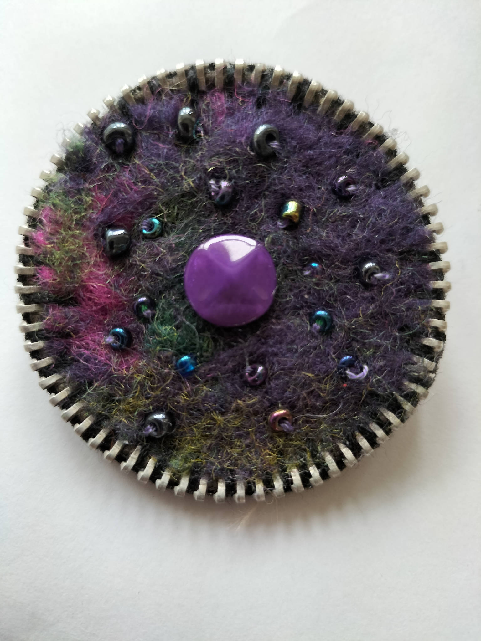 Purple/black handfelted brooch