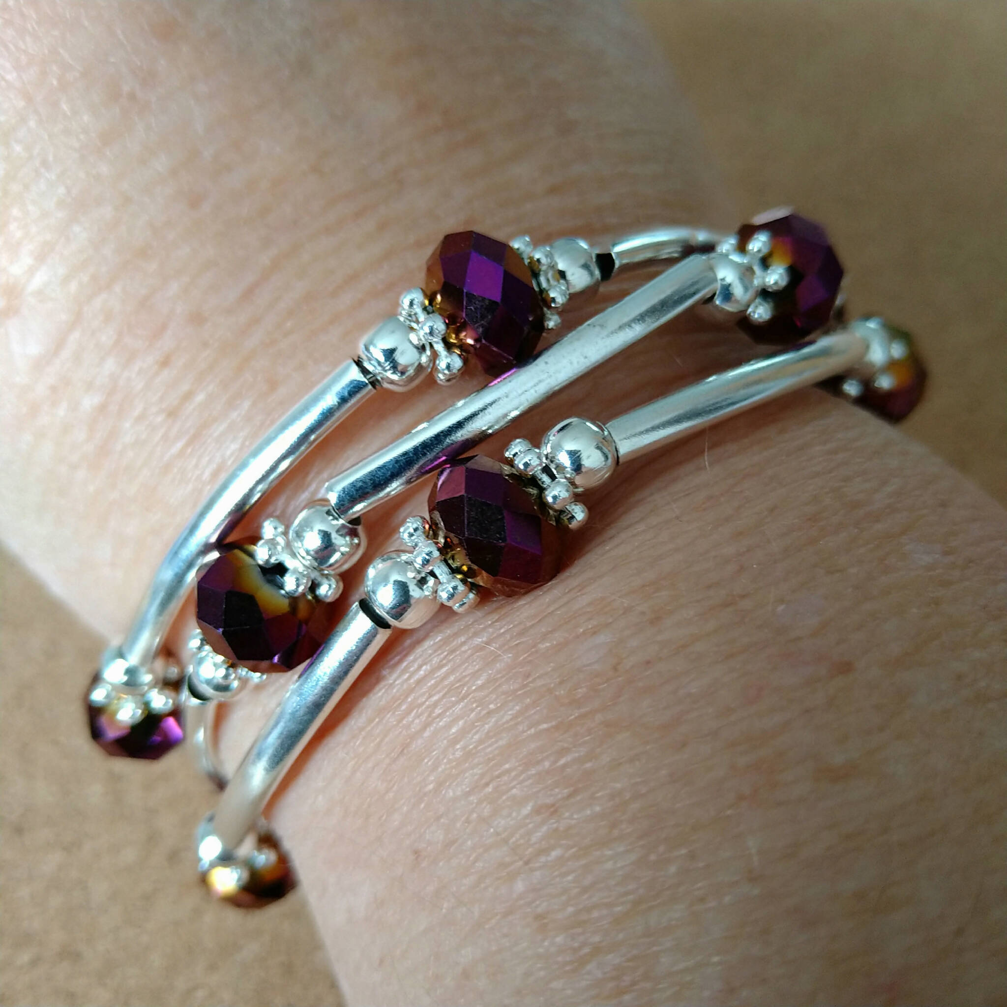 2.5 strand silver toned memory wire bangle with purple AB & silver coloured beads, 6.5cm diameter
