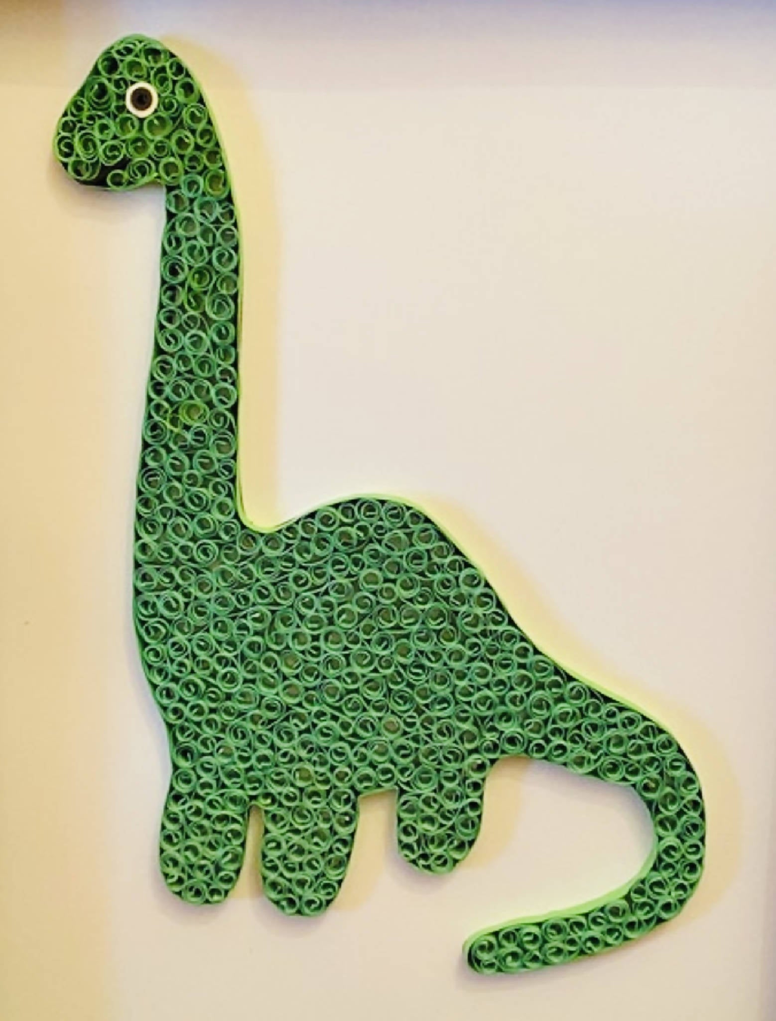Quilled paper dinosaur picture