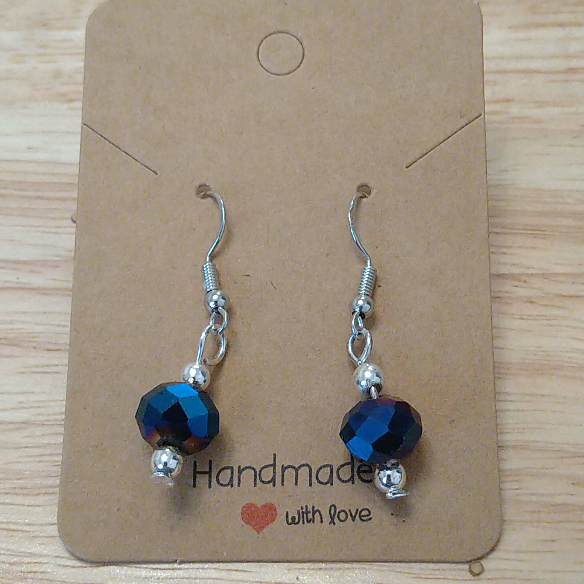 Handmade earrings with blue faceted AB bead