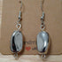Handmade earrings with silver coloured "nugget" bead