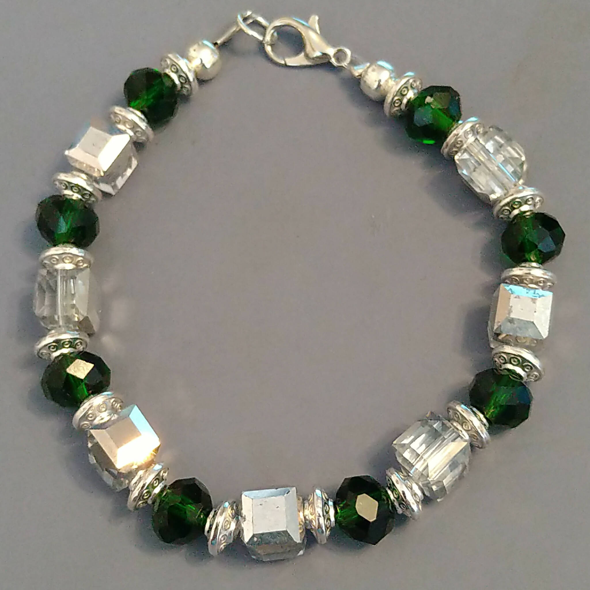 Green & Silver coloured bracelet, handmade using recycled beads. 18cm length, but an extender chain can be added upon request.