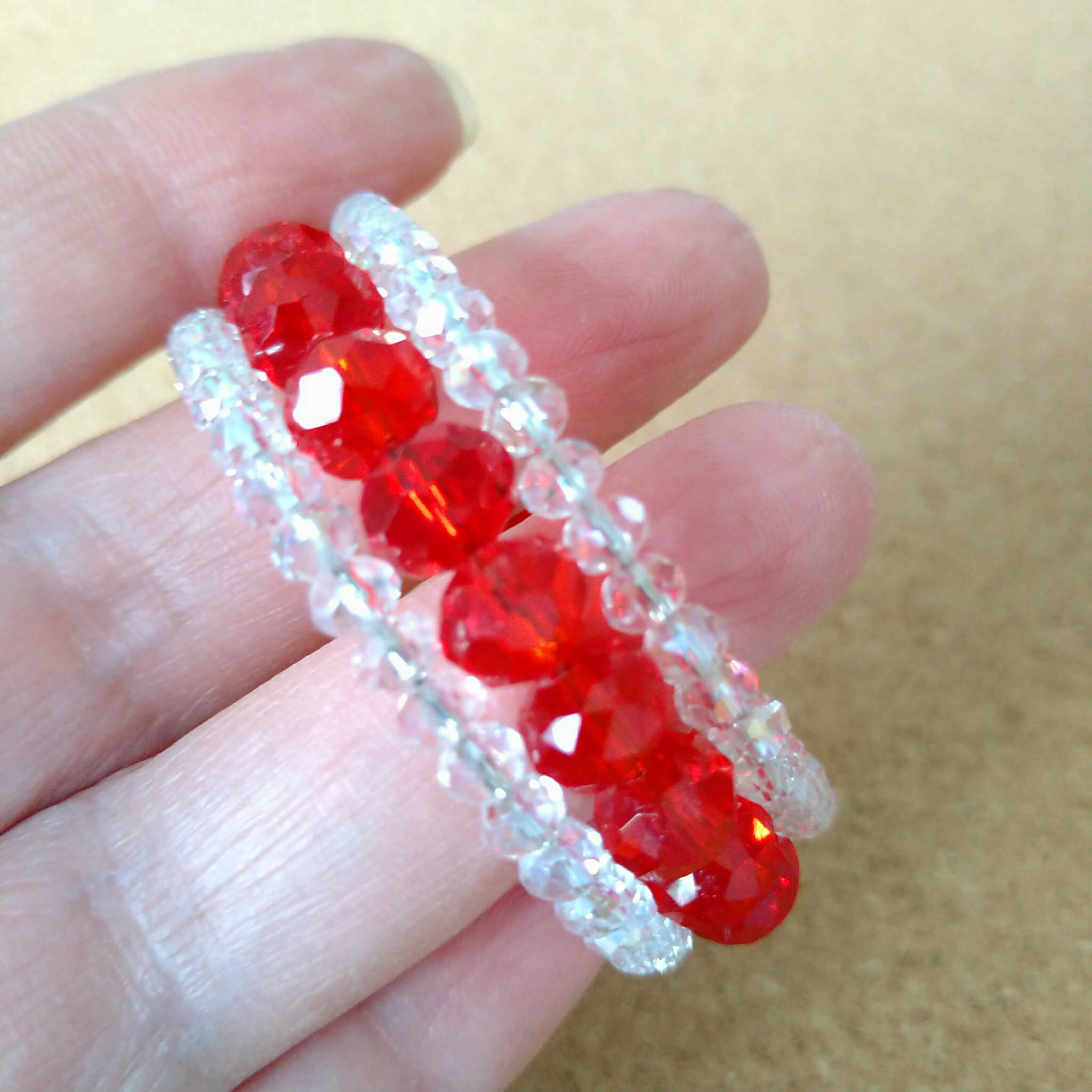 3 strand silver toned Memory wire child's bangle with red & clear beads - 4cm diameter
