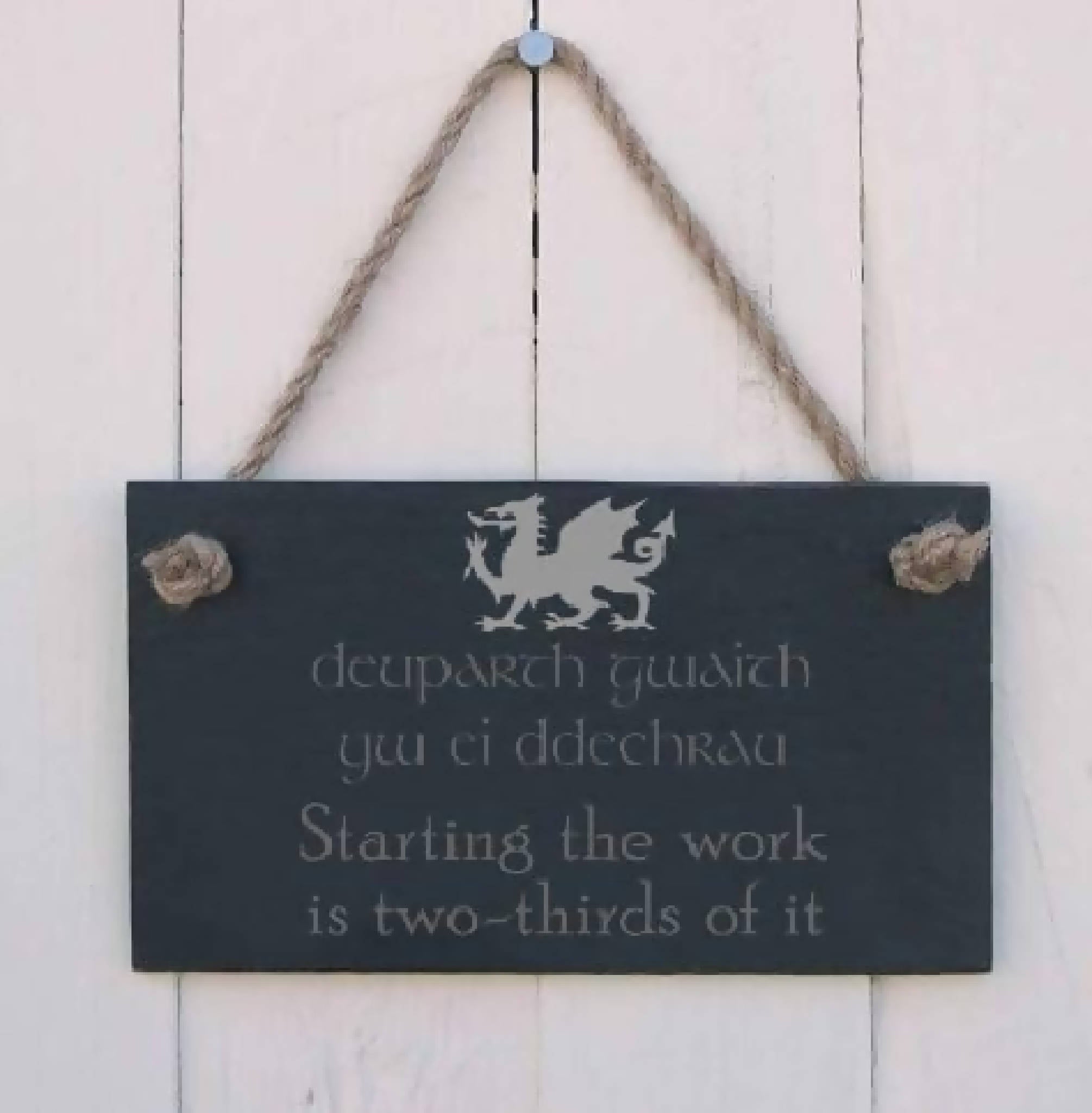 Bi-lingual Welsh slate hanging sign - "Starting the work is two thirds of it"...