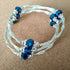 3 strand silver toned crimped memory wire bangle with blue & silver coloured beads, 6.5cm diameter