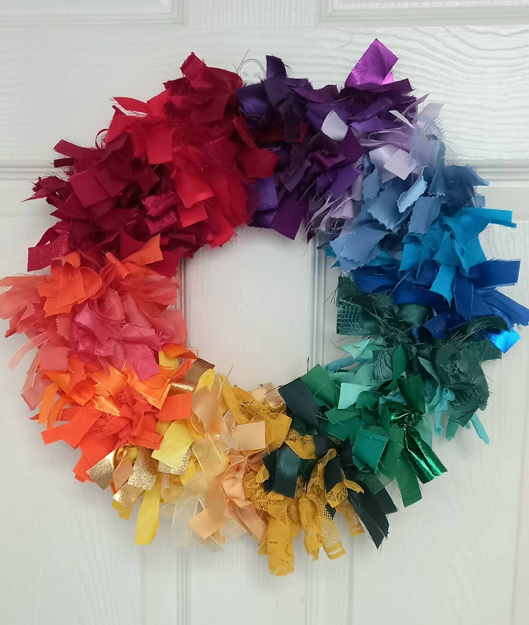 Rainbow Rag Wreath with Red Hanging Ribbon