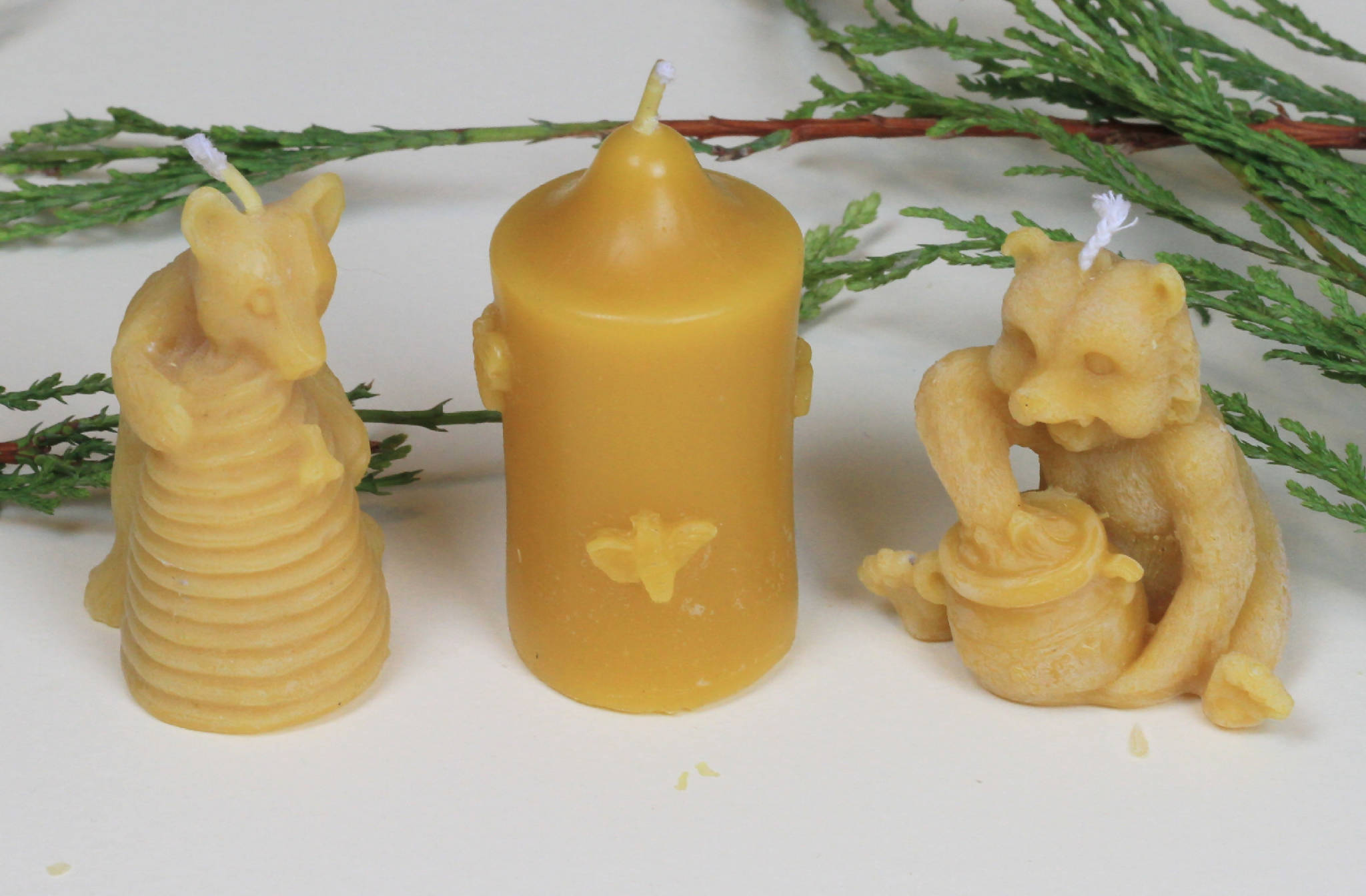 three beeswax candles