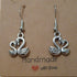 Handmade earrings with silver coloured swan charms