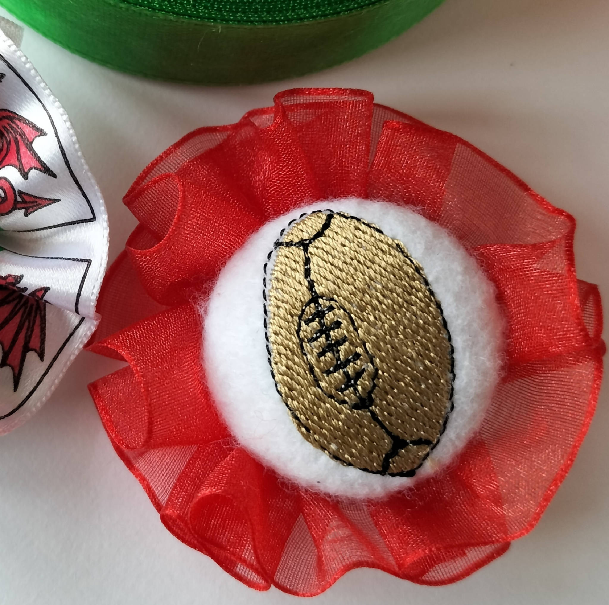 Rugby ball brooch