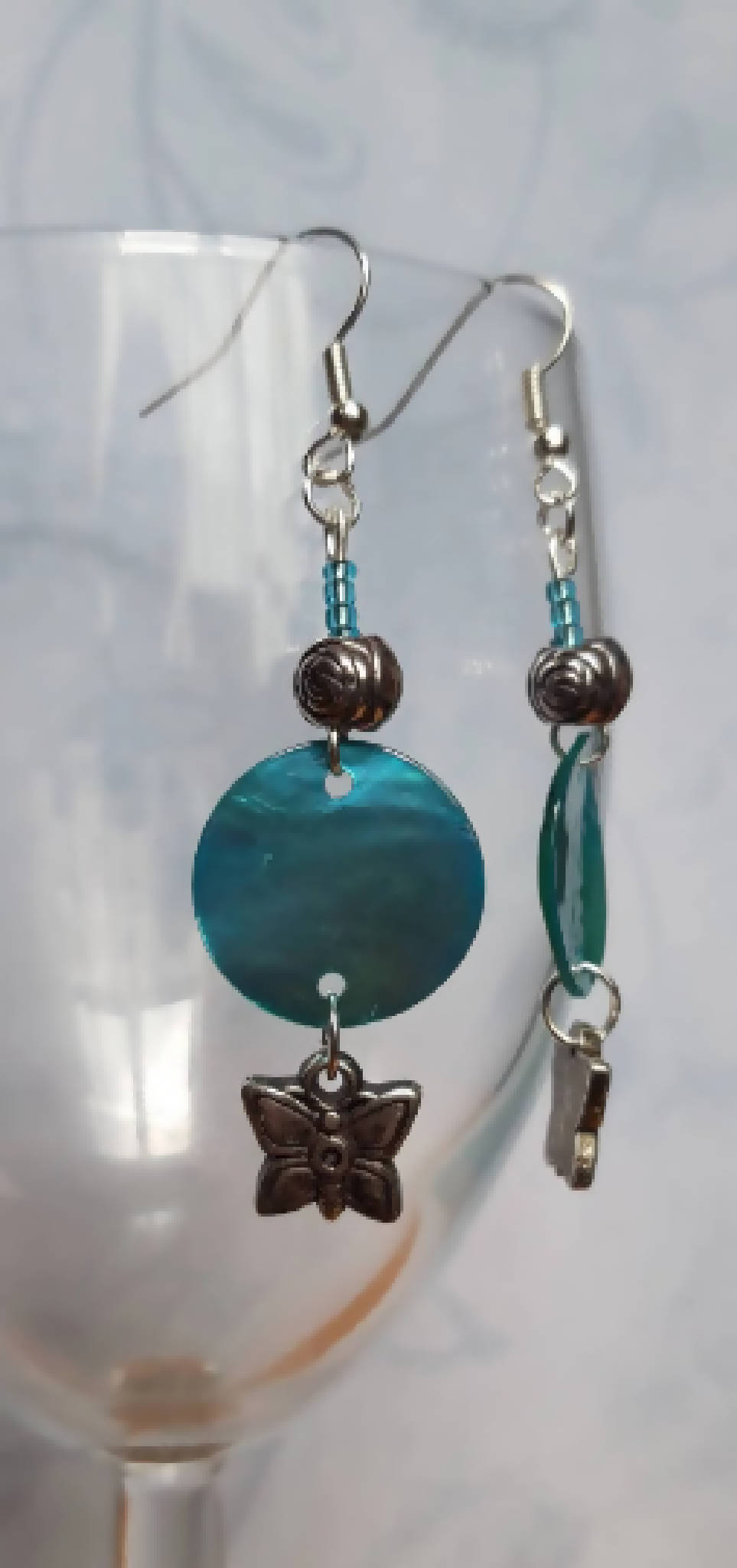 Teal shell and butterfly earrings