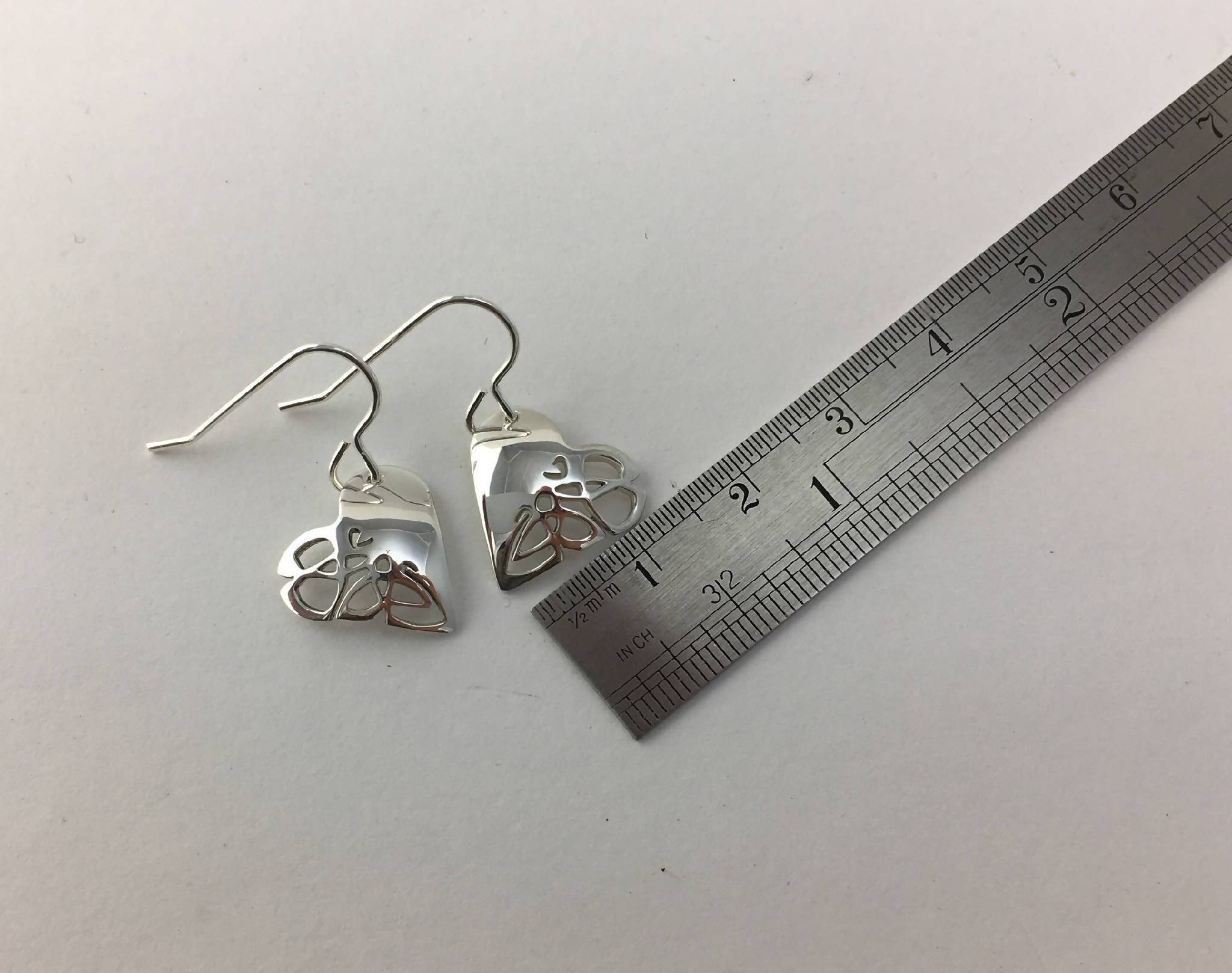 Heart shaped short drop earrings with Celtic knot design