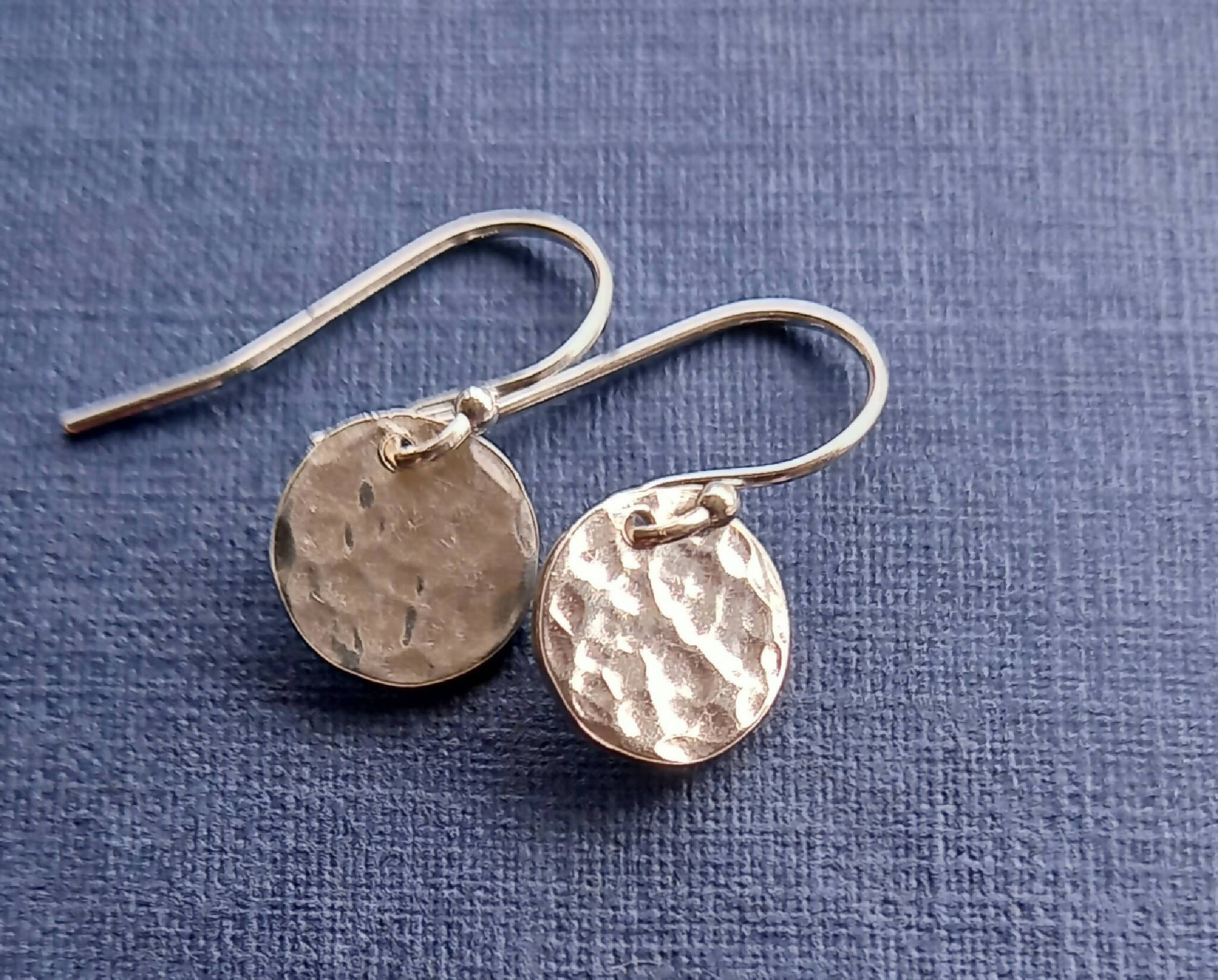 Hammered silver earrings.