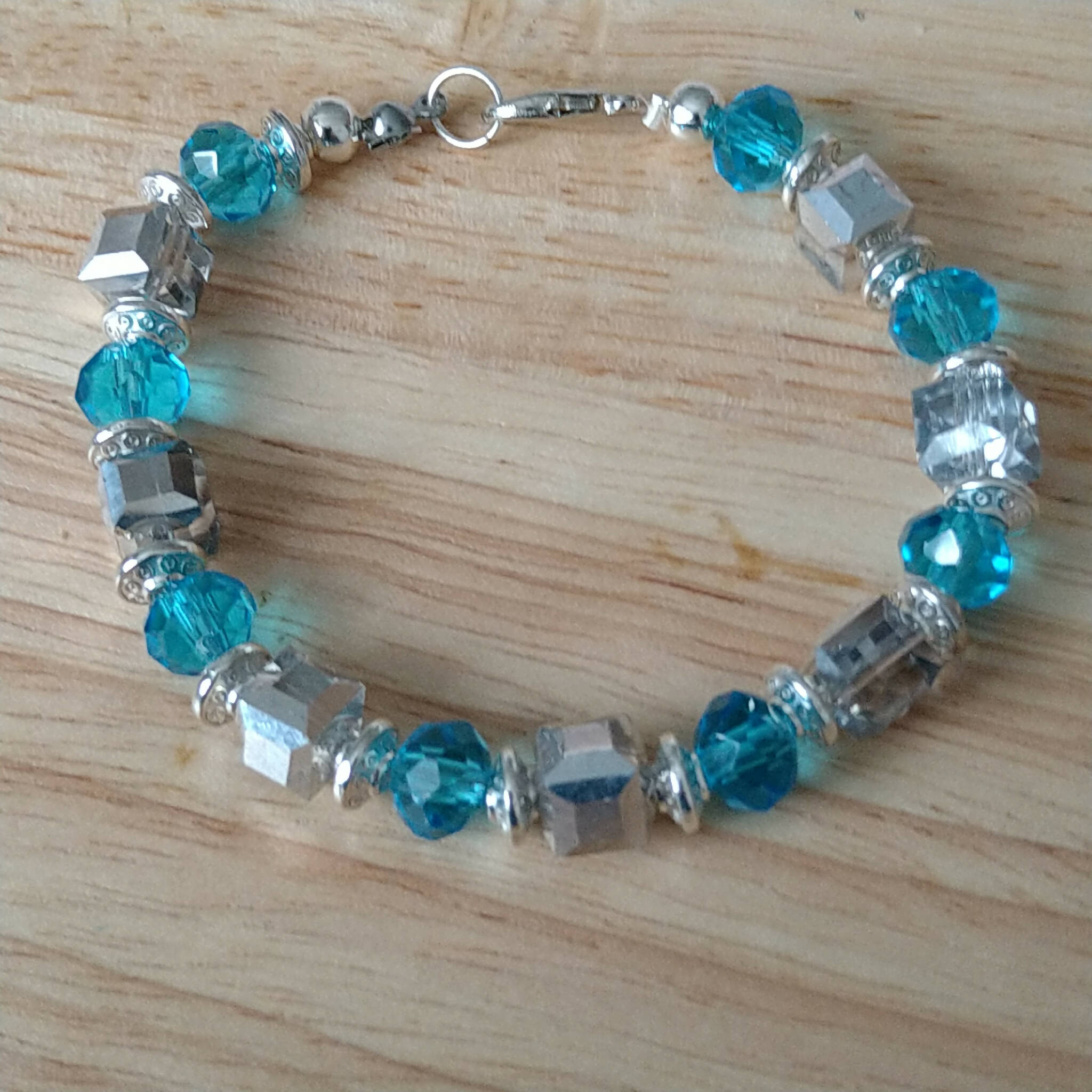 Blue & Silver coloured bracelet, handmade using recycled beads. 19cm length