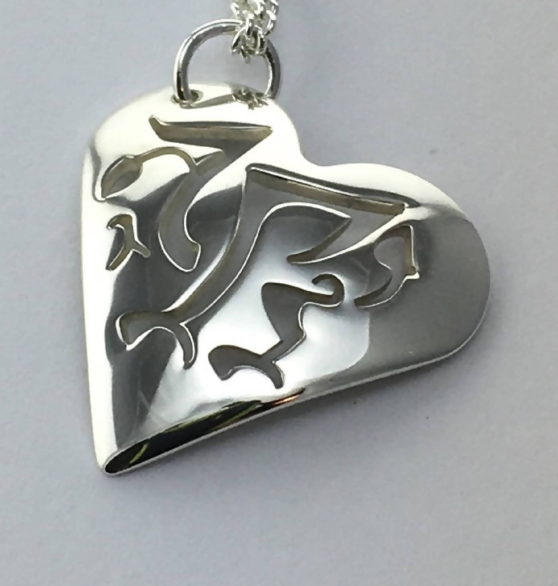 Small Welsh Dragon heart shaped pendant