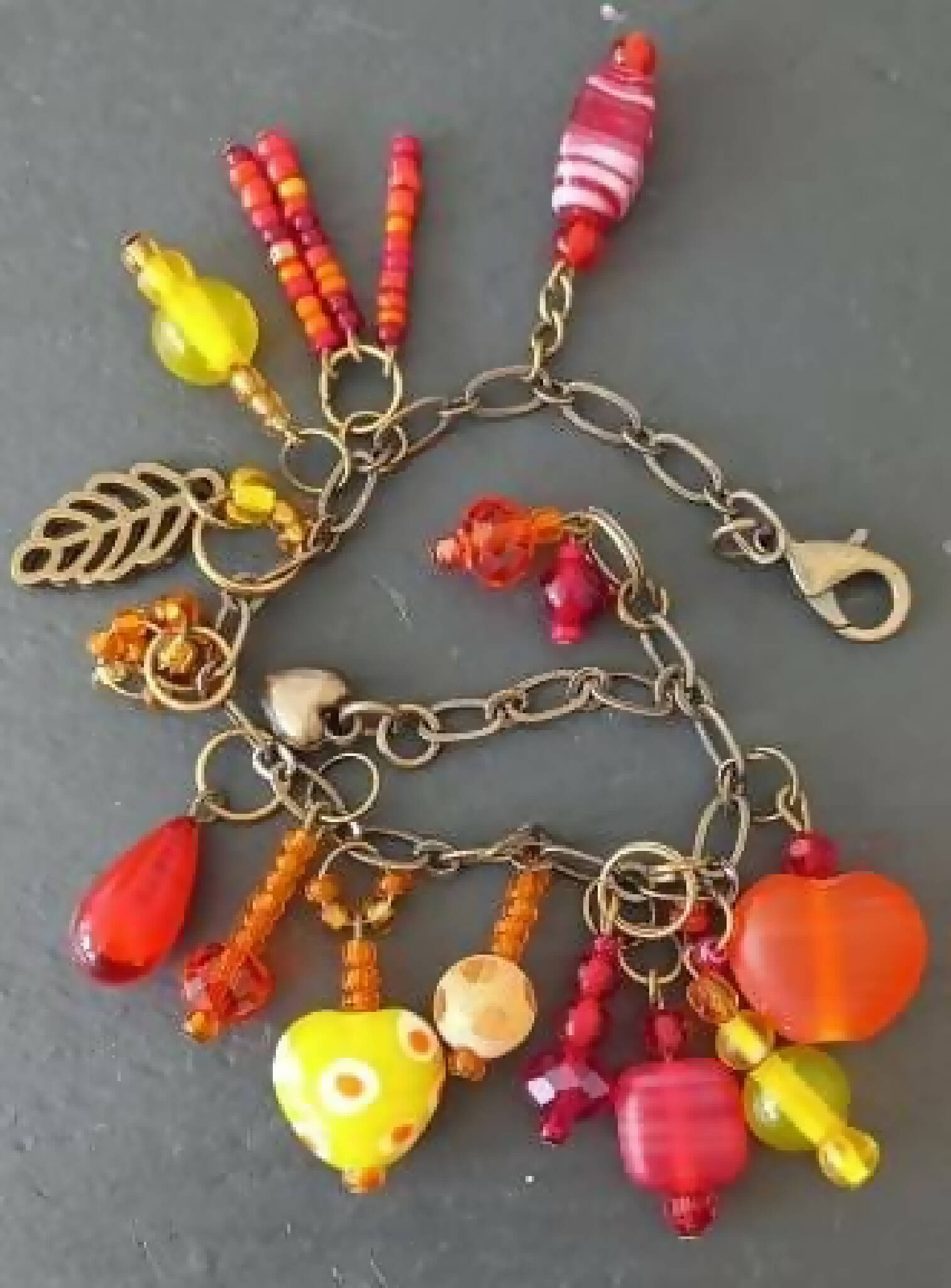 Charm Bracelet in Reds Yellows and Oranges