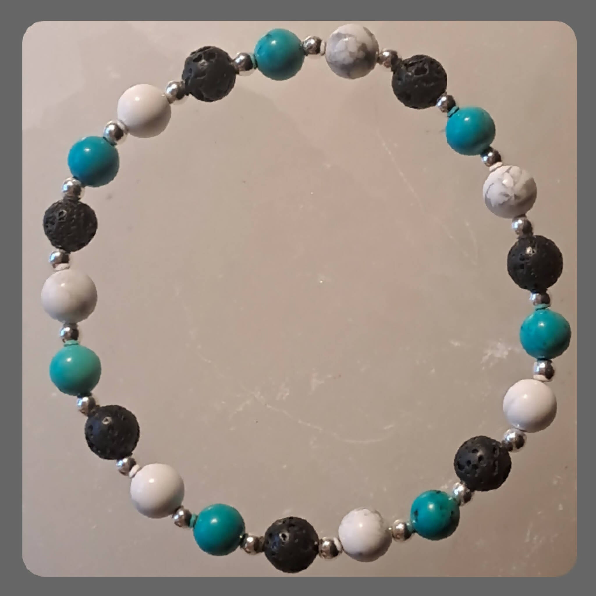 Aromatherapy bracelet with Howlite, Turquoise and Sterling Silver