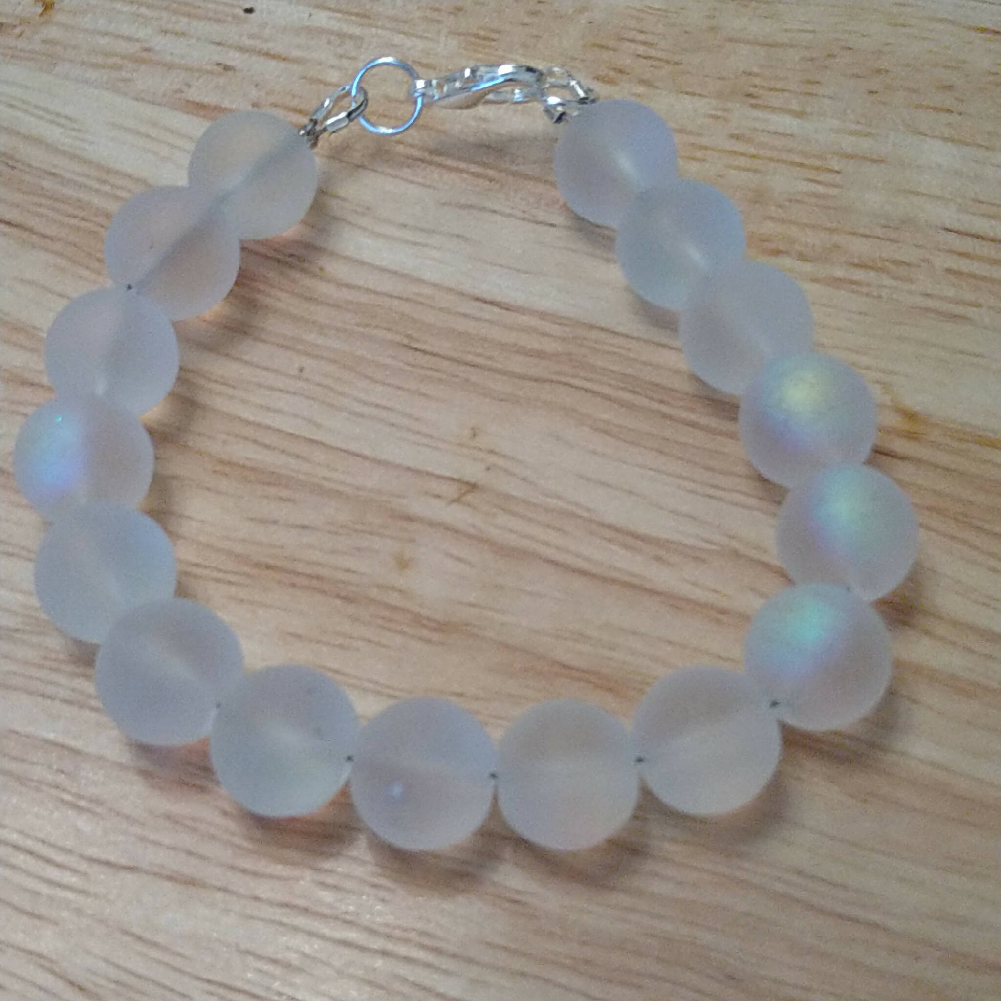White bracelet with Mermaid AB glass beads, handmade. 18cm length