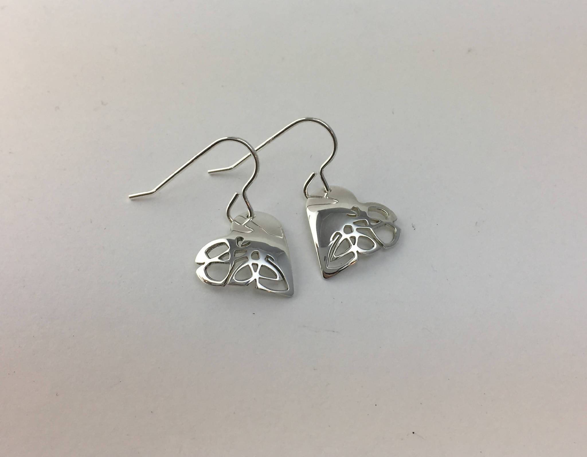 Heart shaped short drop earrings with Celtic knot design