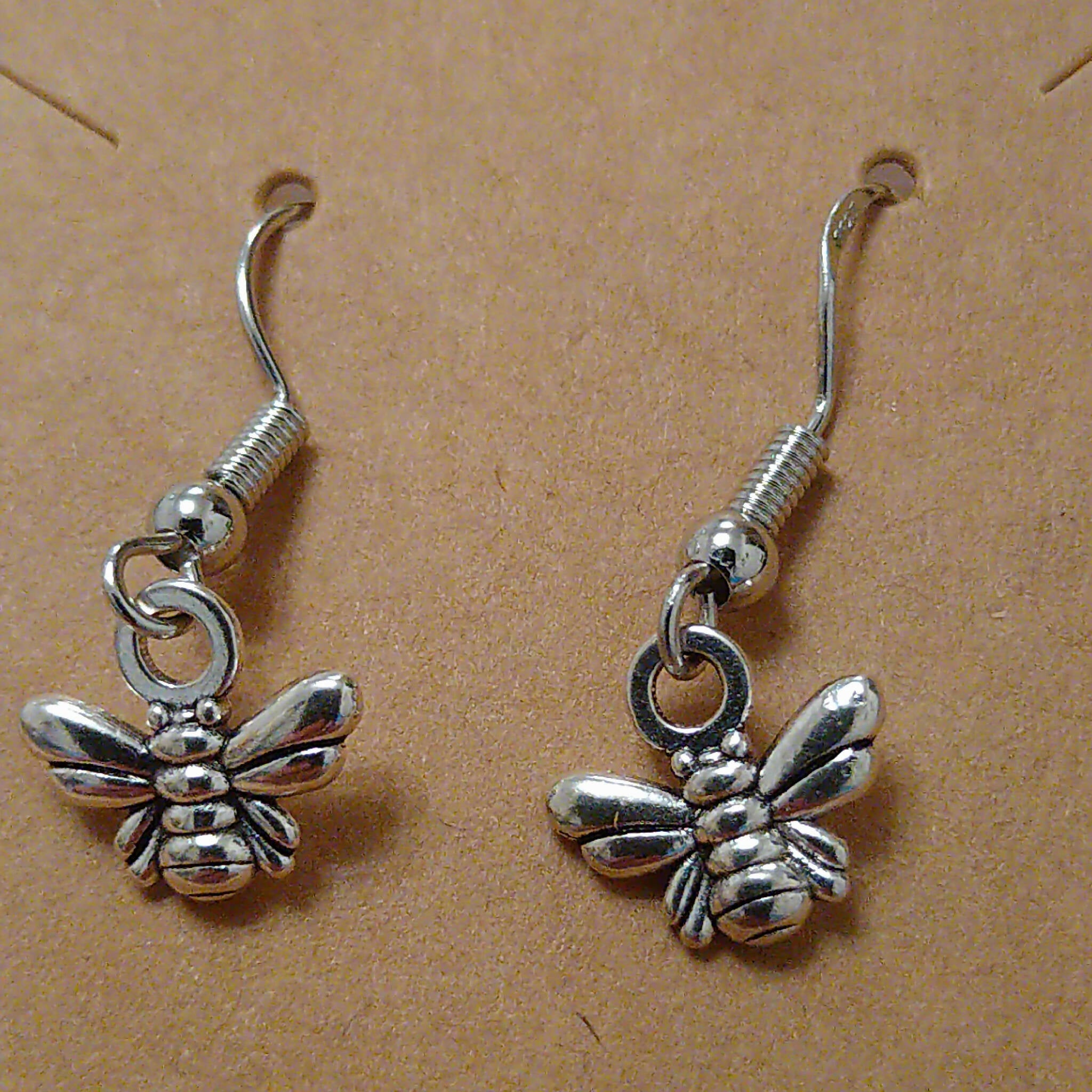 Handmade earrings with silver coloured bee charms