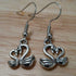 Handmade earrings with silver coloured swan charms