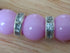 Pink coloured bracelet, handmade using recycled beads & rhinestone spacers. 21cm length
